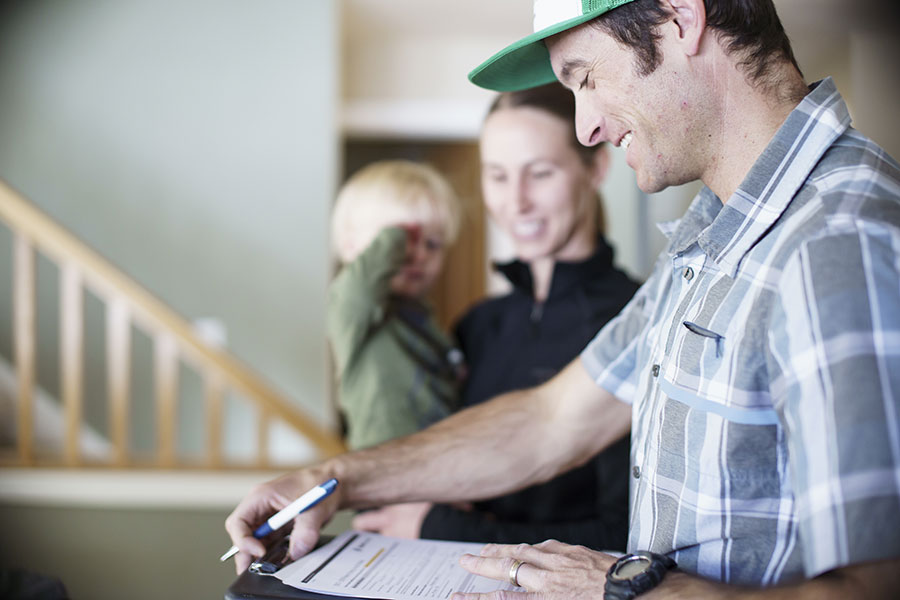 Certified Building Analyst conducting a home energy assessment